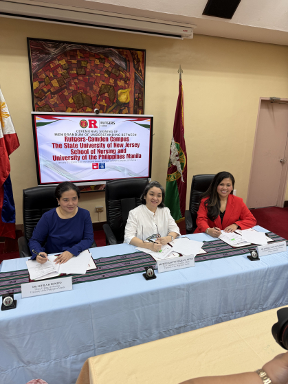 Signing the MOU with the University of the Philippines.